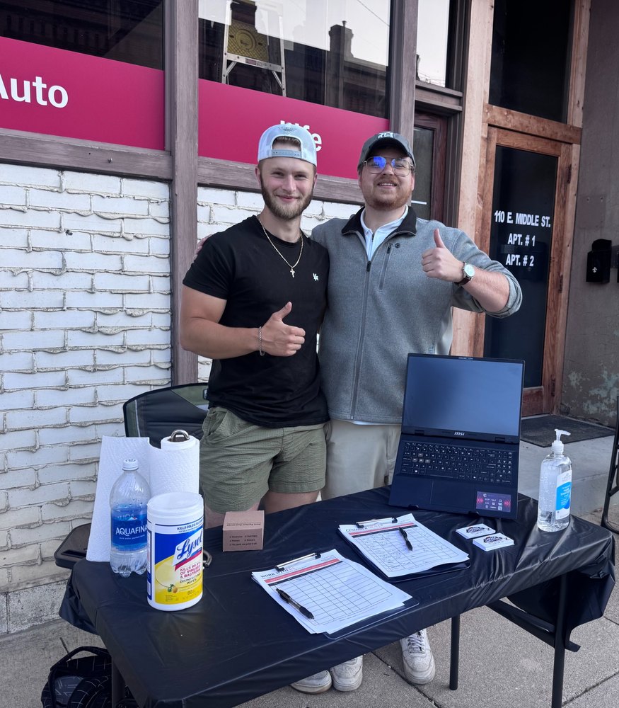 The Garage Sweepers launch day table with both owners